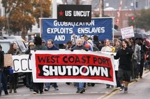 USA/Canada: Les "indignés" tentent de bloquer les ports du Pacifique