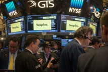 Les traders à Wall Street au cours de l'introduction en Bourse de Snap Photo Bryan R. Smith. AFP