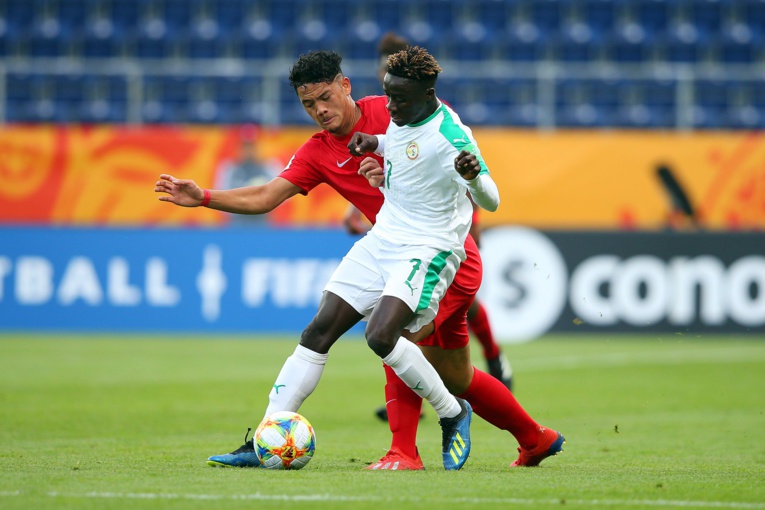 Terai Brémond face à amadou Sagna © FIFA via Getty Images Terai Brémond face à amadou Sagna © FIFA via Getty Images