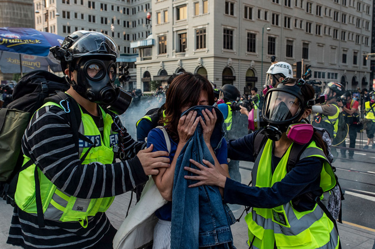 Hong Kong: gaz lacrymogènes contre les manifestants de retour dans les rues