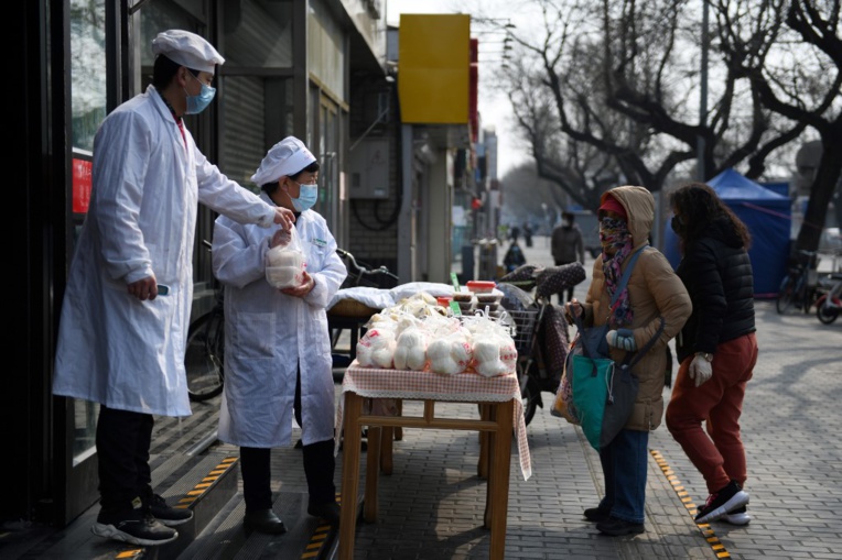 Le port du masque, une mesure préventive.  GREG BAKER / AFP
