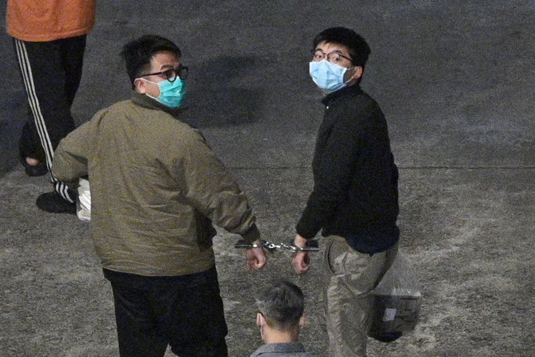 Hong Kong: peines d'emprisonnement pour Joshua Wong et deux célèbres militants prodémocratie Hong Kong: peines d'emprisonnement pour Joshua Wong et deux célèbres militants prodémocratie