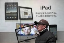 L'accord China Mobile/Apple salué par les usagers, en guettant la 4G L'accord China Mobile/Apple salué par les usagers, en guettant la 4G