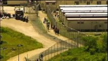 Un mort et 77 blessés dans un centre de rétention australien