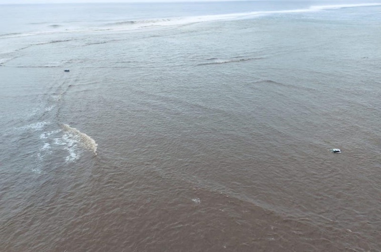 À Teahupo'o, l'orage après la houle À Teahupo'o, l'orage après la houle