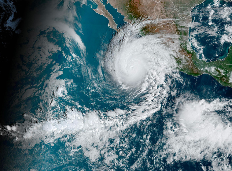 Handout / NOAA/GOES / AFP Handout / NOAA/GOES / AFP