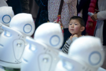A Pékin, des Chinois passionnés rêvent des robots de demain A Pékin, des Chinois passionnés rêvent des robots de demain
