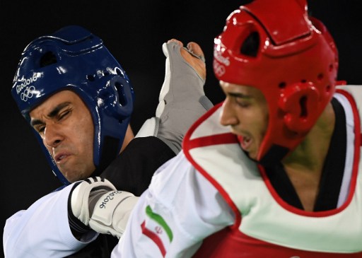 Pita Taufatofua face à Sajjad Mardani. image : Kirill Kudryavtsev/AFP Photo
