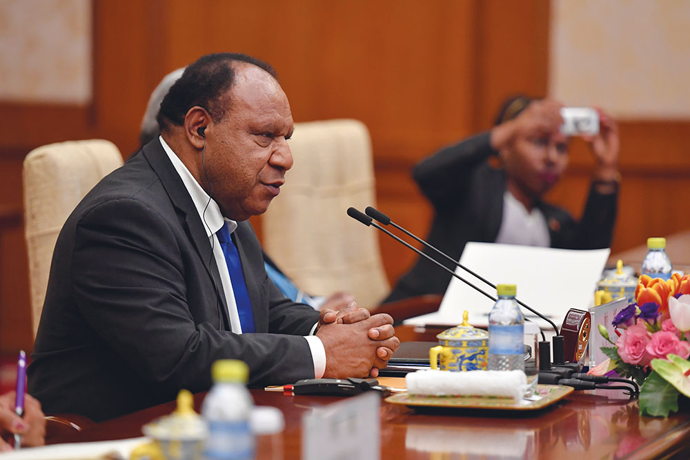 Quand des responsables chinois tentent de forcer la porte d'un ministre papouasien