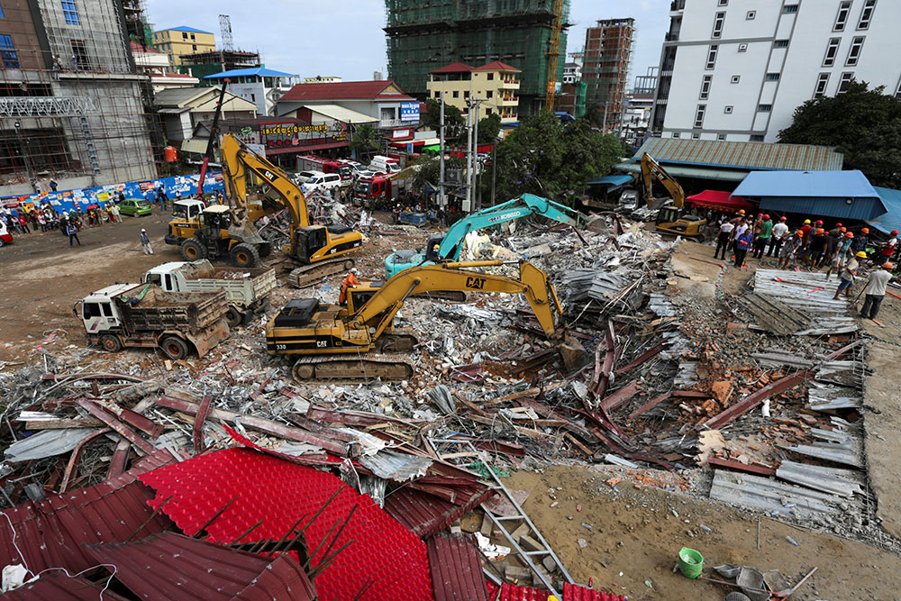 Immeuble effondré au Cambodge: au moins 28 morts, deux survivants miraculeusement retrouvés