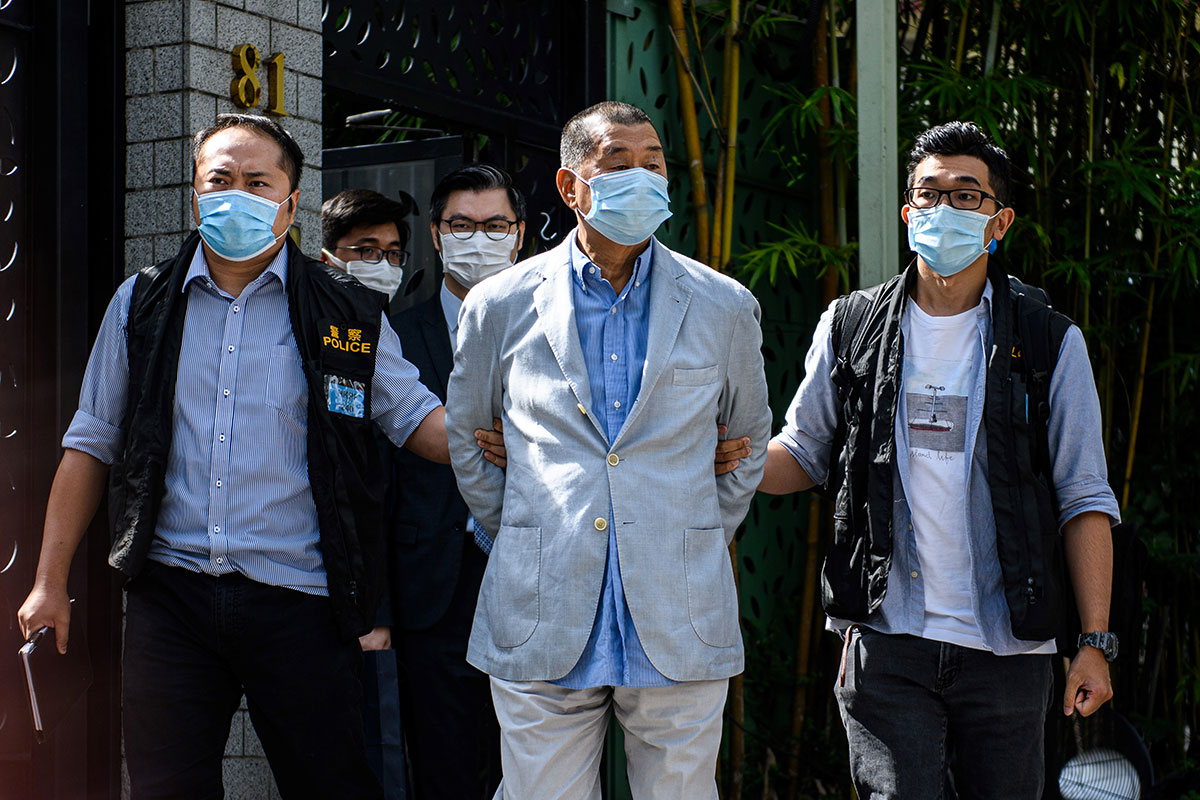 Hong Kong: un magnat de la presse et une militante prodémocratie arrêtés