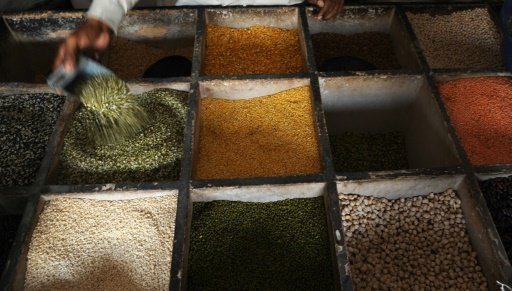 © AFP / Par Céline SERRAT | Une épicerie indienne à Allahabad, le 23 septembre 2009