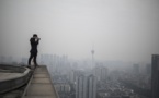Chine: il grimpe sur les gratte-ciel pour des photos choc