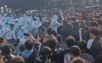 Chine: six millions de personnes confinées après une flambée de Covid et de violentes manifestations