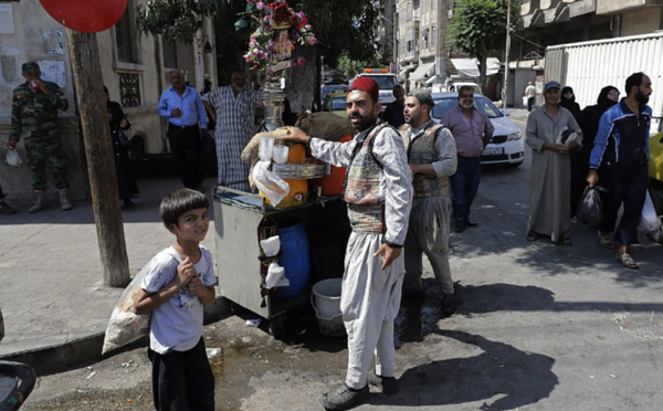 Pour les déplacés de la côte syrienne, le lent retour vers Alep