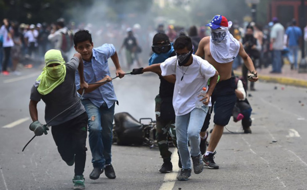 Venezuela: Maduro face à son opposition et à Washington