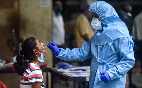 Virus: nouveaux reconfinements en Inde, proche du million de cas déclarés