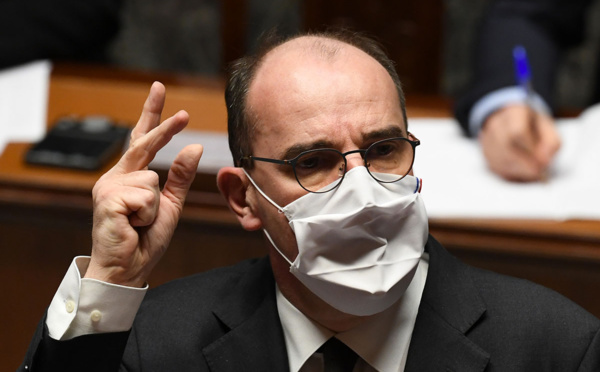 Covid: Macron envisage une campagne de vaccination grand public "entre avril et juin"