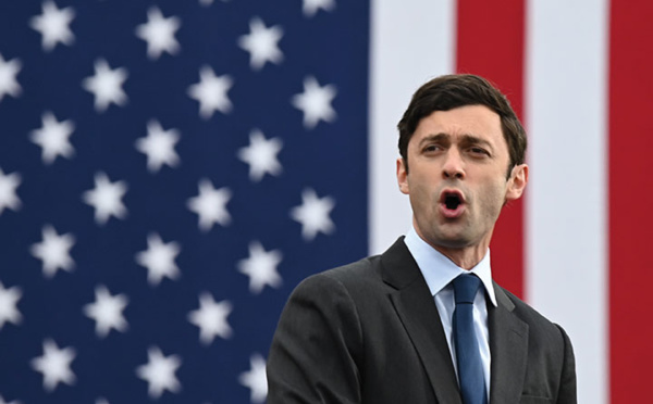 Biden promet "unité" et "action" après la victoire probable des démocrates en Géorgie