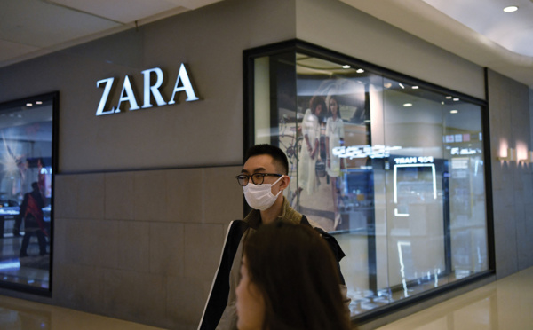 Travail forcé des Ouïghours: plainte en France contre quatre multinationales de l'habillement