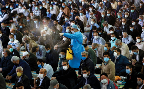 Cinq millions de morts du Covid: une barre symbolique et des scénarios ouverts