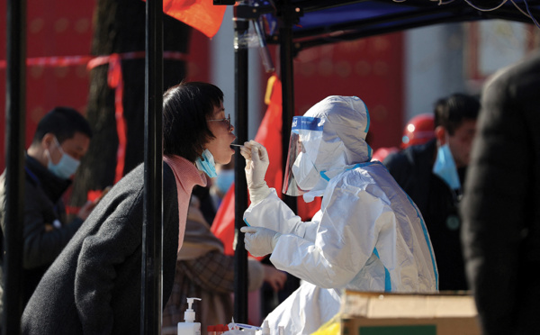 Covid-19: la Chine confine une ville de 13 millions d'habitants