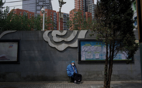 Covid-19: nouvelles restrictions à Pékin, aux airs de ville fantôme