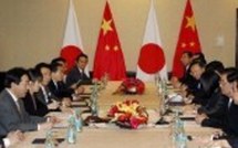 Hu promet d'aider la croissance mondiale, Obama critique la Chine