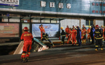 Chine: un bus englouti par la chaussée, 6 morts