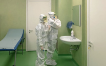 Face à l'épidémie, la Chine confine des villes entières