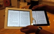 Livres électroniques: Apple jugé coupable d'entente sur les prix aux USA