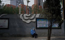 Covid-19: nouvelles restrictions à Pékin, aux airs de ville fantôme