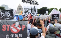 Le Japon adopte des lois de défense controversées